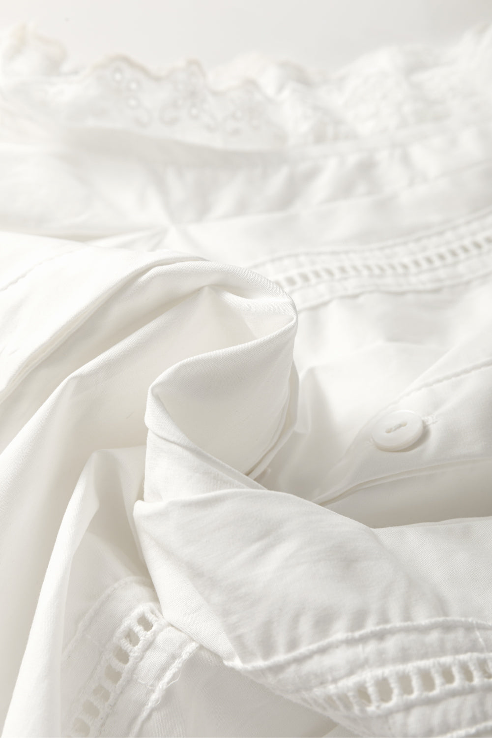 White Eyelet Sleeveless Buttoned Shirt