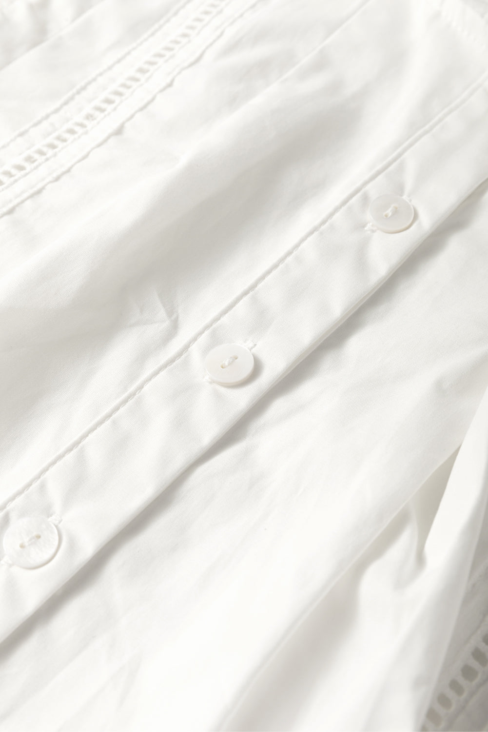 White Eyelet Sleeveless Buttoned Shirt