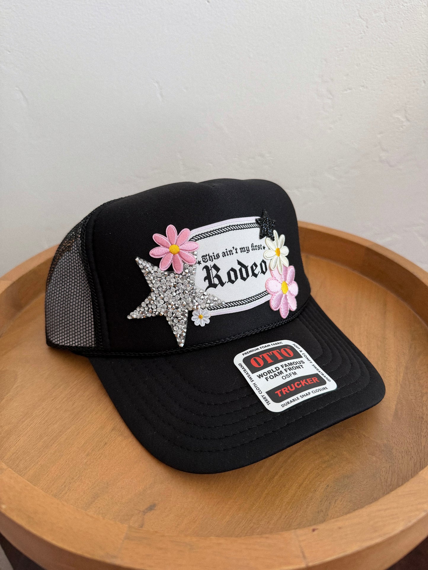 Black Ain’t My First Rodeo Patch Trucker Hat